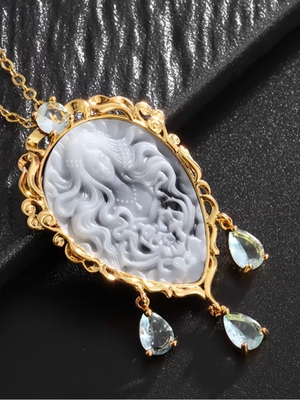 Gold-Tone White Cameo Pendant Necklace with Pale Blue Teardrop Accents